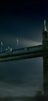 Night view of Tower Bridge with mist and moonlight.