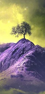 Lonely tree on a purple mountain with yellow sky.