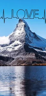 Snowy mountain with 'LOVE' in sky reflection.