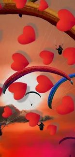 Vivid red heart shapes with paragliders in an orange sky.