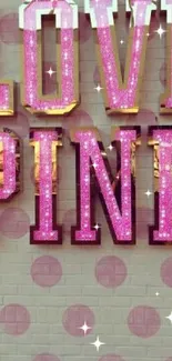 Pink brick wall with 'Love Pink' glowing text and dog heart emblem.