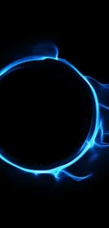 Luminous blue energy ring on dark background wallpaper.