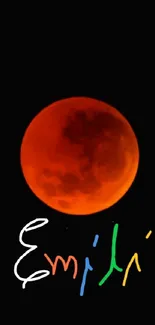 Vivid lunar eclipse with colorful text on black background.