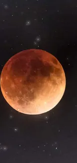 Red moon during a lunar eclipse with stars.