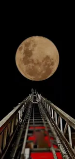 Wallpaper featuring a ladder reaching up towards a full moon in a dark sky.