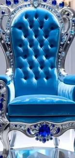 Luxurious blue throne with silver and gemstone details.