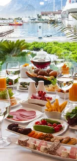 Luxurious breakfast table with sea view and fresh juices.