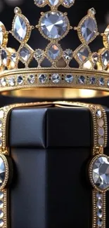 Golden crown with gems on black gift box wallpaper.