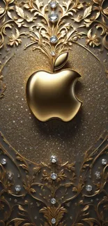 Luxurious golden apple with ornate patterns on phone wallpaper.