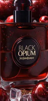 Black Opium perfume bottle with cherries and ice.