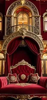Luxurious royal red sofa with gold detailing in an opulent setting.