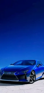 Luxury blue car with vivid sky background, perfect for mobile wallpaper.