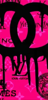 Luxury brand logos on a pink background wallpaper.