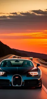 Luxury car driving on an open road with a vibrant sunset in the background.