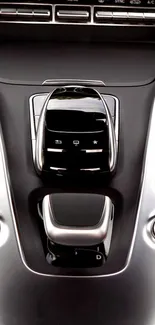 Sleek luxury car console with elegant buttons and metallic accents.