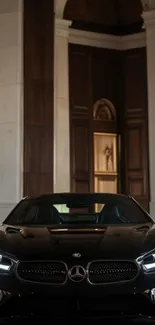 Luxury car parked in an elegant, dimly lit hall showcasing sophisticated design.