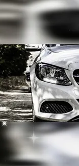 Elegant white luxury car on a scenic road.