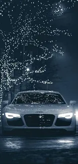 Luxury car with lights on a dark city street at night.