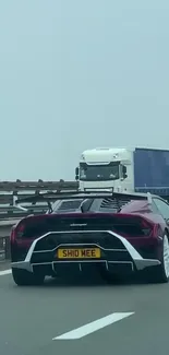 Luxury sports car driving on a highway.