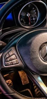 Close-up of a luxury car steering wheel with intricate details.