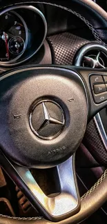 Luxury car steering wheel with elegant design and details.