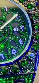 Luxury watch with green gemstones and exquisite design.