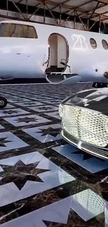 Luxury jet and car on intricate floor.