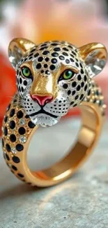 Gold leopard ring with green eyes on a colorful background