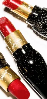 Designer lipstick wallpaper with red, black, and gold hues on a white background.