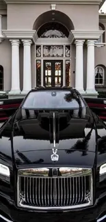 Luxurious car at grand mansion entrance displaying elegance.