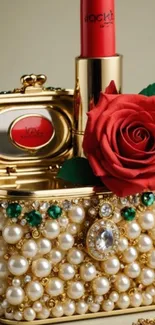 Gold box with pearls, red rose, and lipstick.