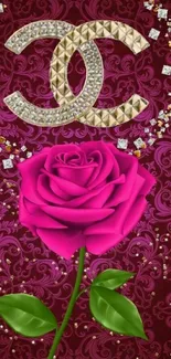 Luxurious wallpaper with pink rose and gold emblems on burgundy background.