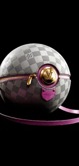 Luxury spherical handbag on black background.