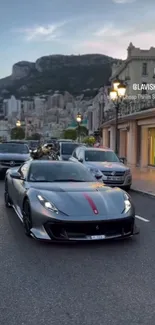 Luxury sports car on city street with scenic view.