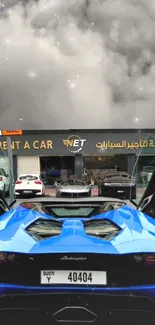 Luxury blue sports car in front of elegant car rental shop.