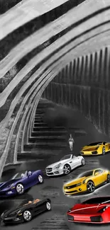 Colorful sports cars under monochrome tunnel.