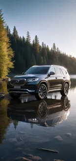 SUV parked by a tranquil lake with reflection.