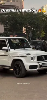 Luxury SUV on a city street during daytime.