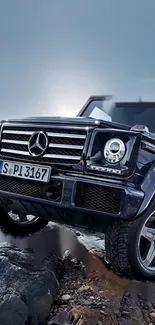 Mercedes SUV driving on rocky terrain