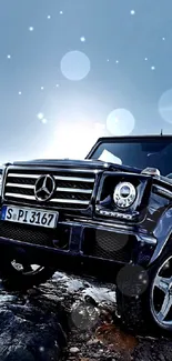 Black luxury SUV on rocky terrain with a blue sky.