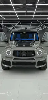 Luxury SUV in a modern showroom with open doors and stylish design.