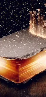 Mobile wallpaper of a sparkling magical book with golden glitter.