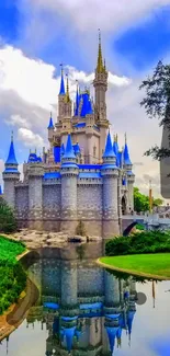 Enchanting castle reflected in water with blue sky.