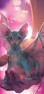 Fantasy cat with wings on hand in pink hues wallpaper.