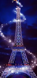 Eiffel Tower glowing at night with sparkling lights against a deep blue sky.