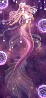 A mystical mermaid in a purple cosmic galaxy with glowing orbs.