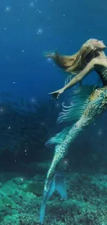 Magical mermaid swimming in deep blue oceanic seascape.