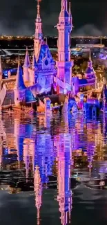 Beautiful castle reflecting in water under a starry night sky.