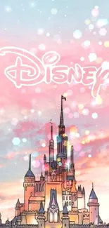 Disney castle in a pink and blue sky wallpaper.