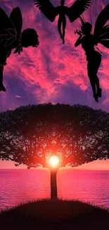 Enchanting sunset wallpaper with fairies and tree.